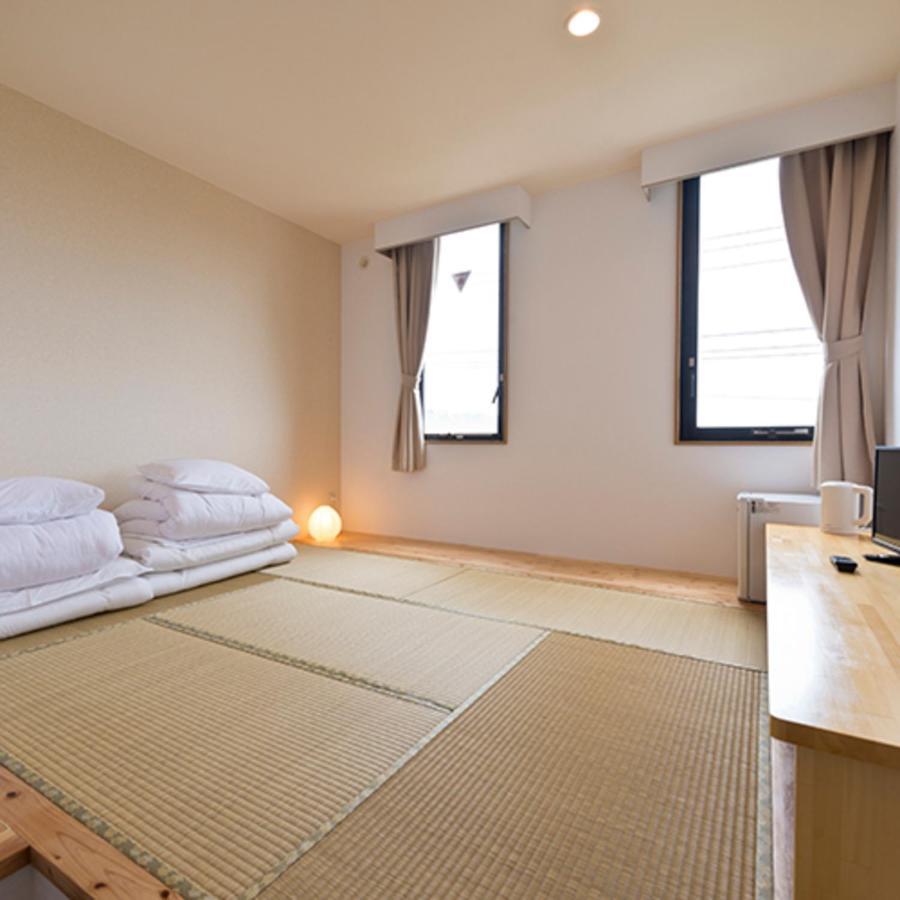 Pangoo Onna Japanese Style Hotel Exterior photo