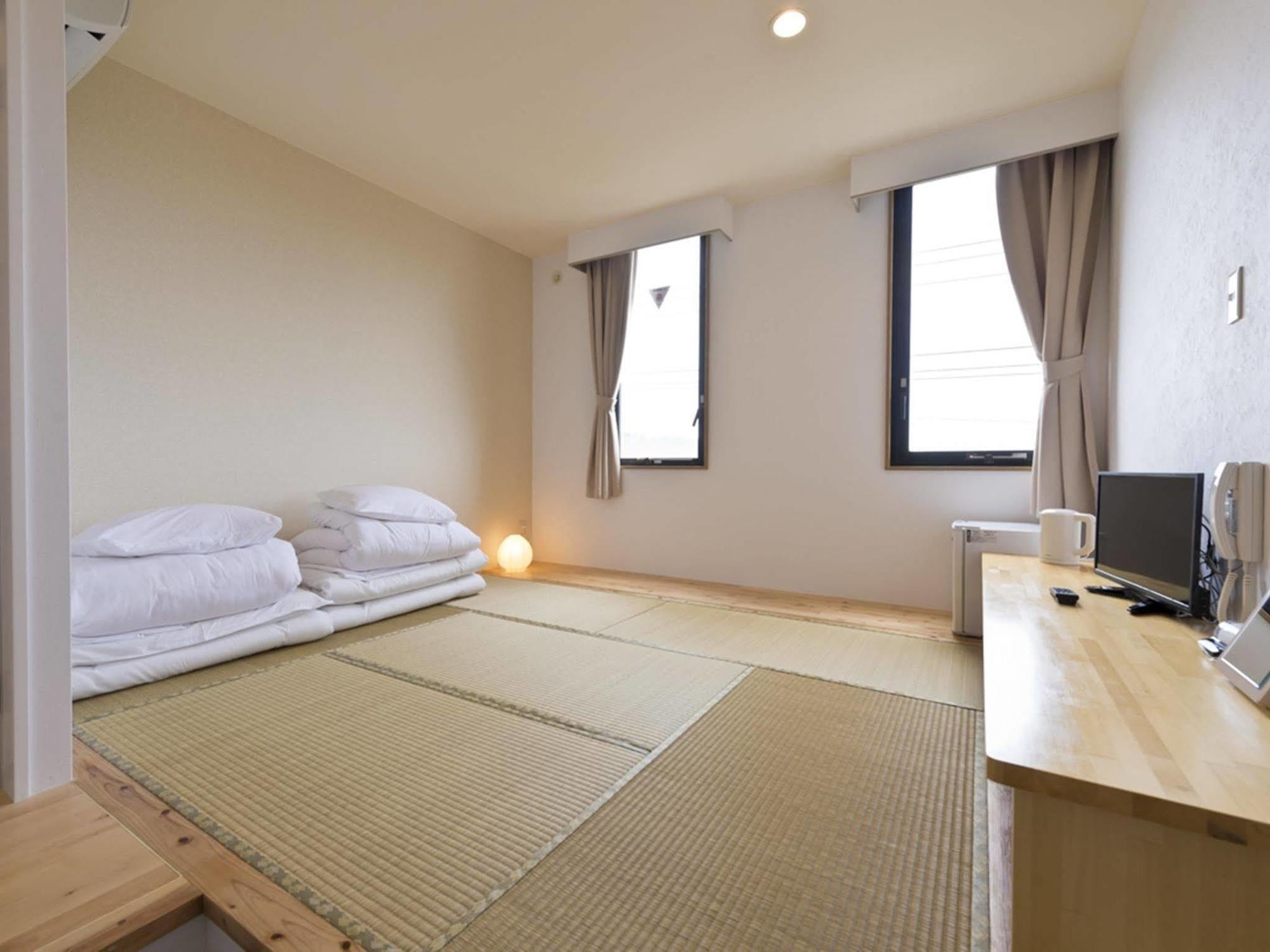 Pangoo Onna Japanese Style Hotel Exterior photo